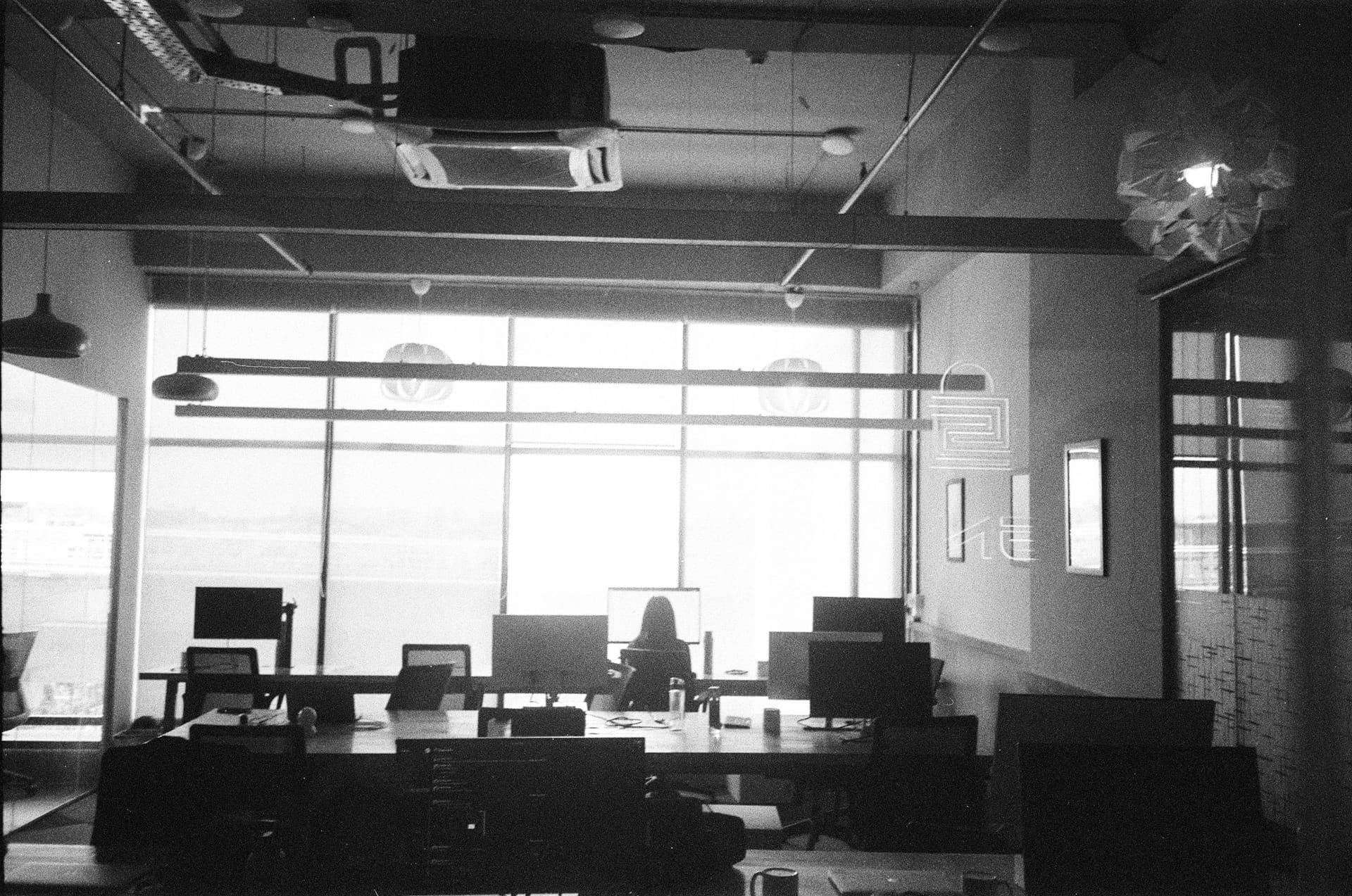 Business technology context: a corporate workspace equipped with computing hardware.