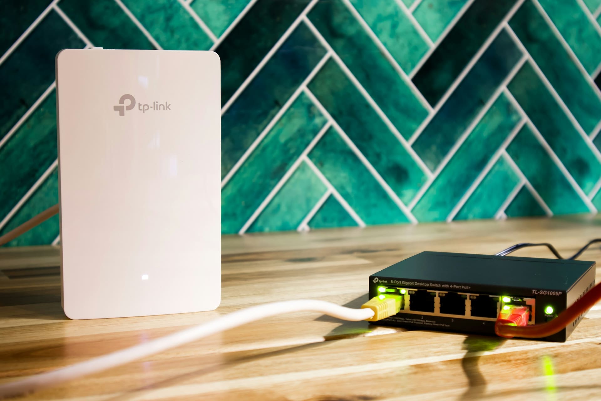 Networking equipment context: a wireless access point installed in an office ceiling.