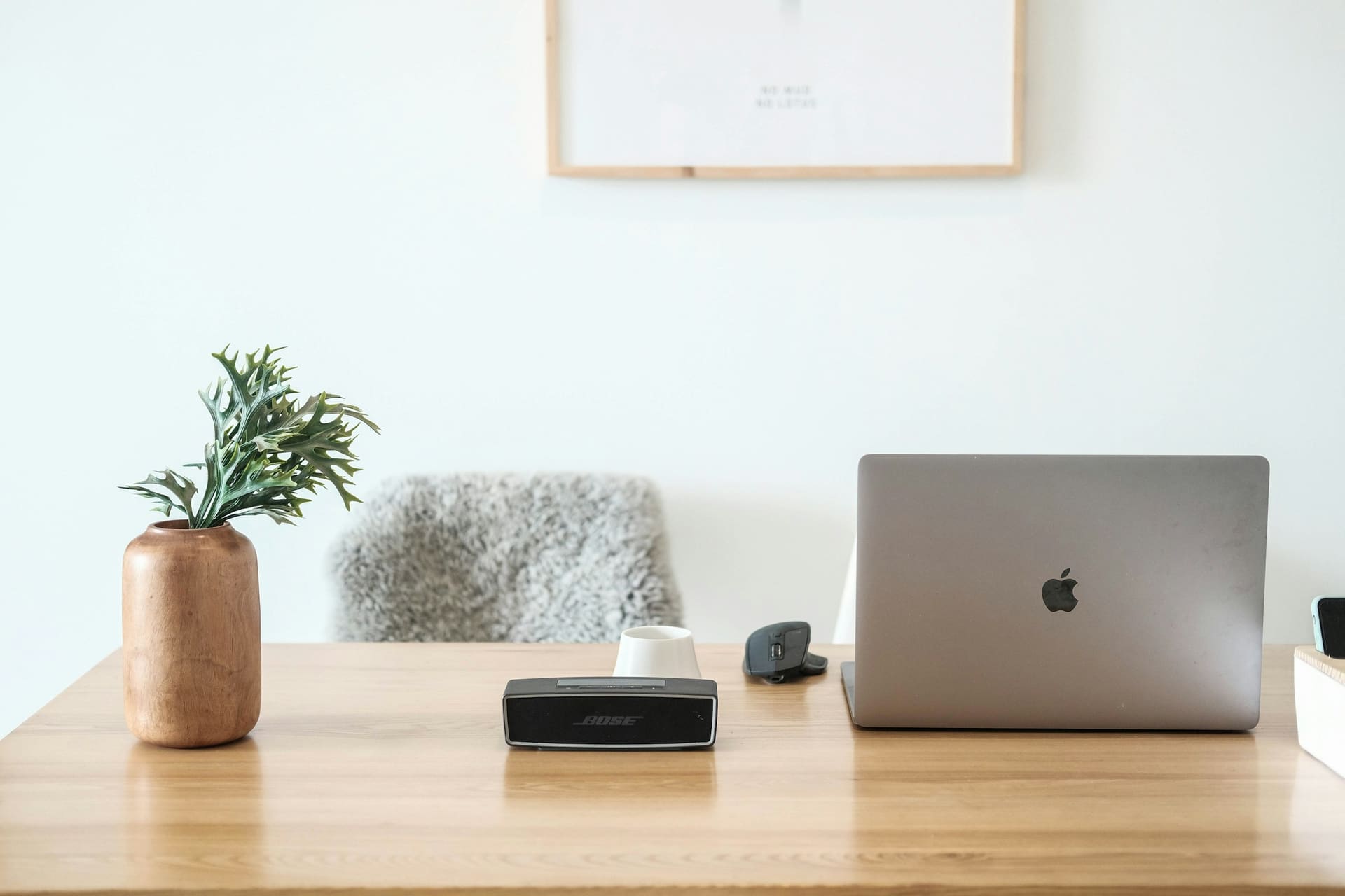 Professional workstation context: a laptop connected to desk peripherals through a hub.