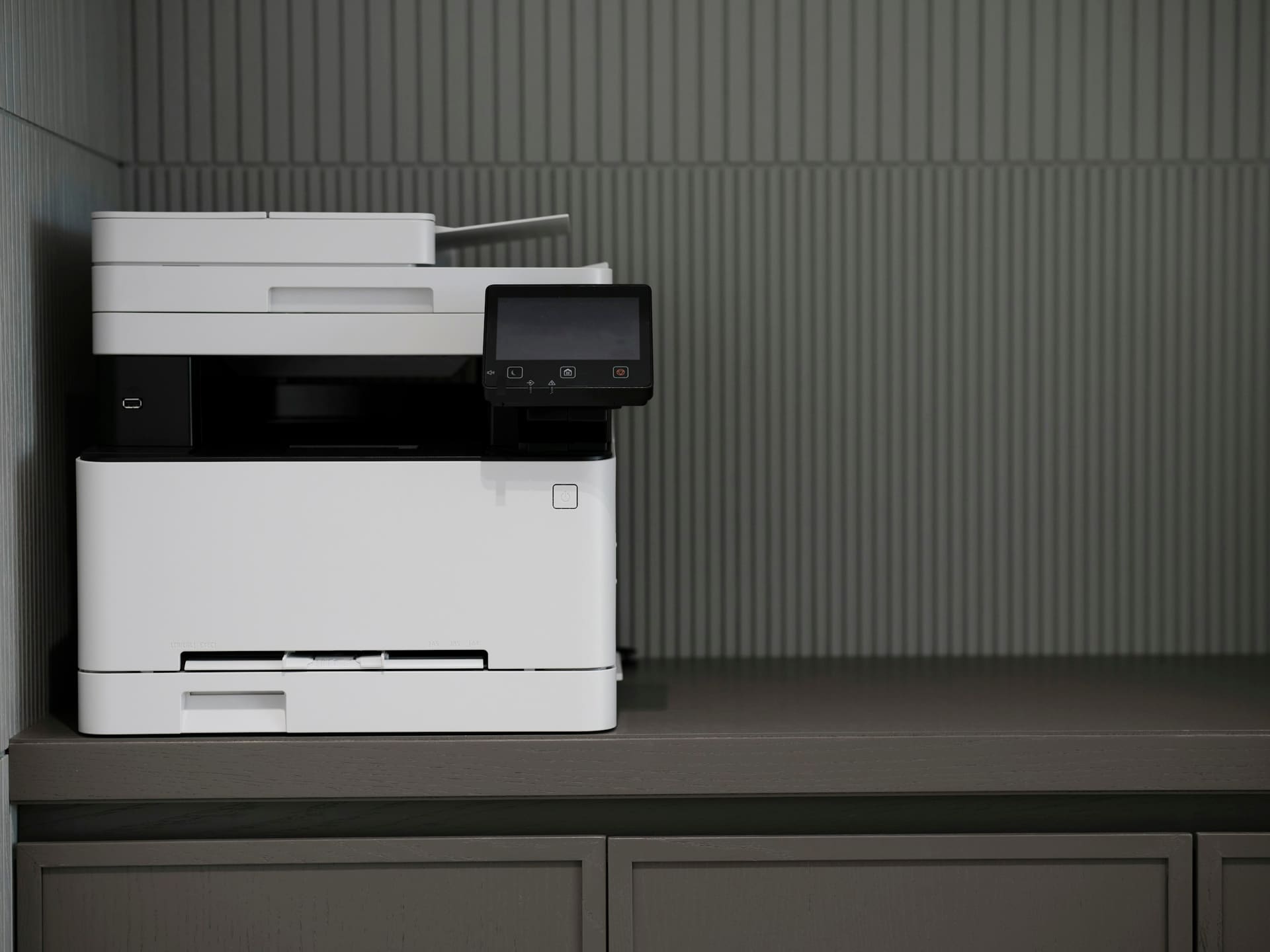 Business technology context: a multifunction copier in a workplace.