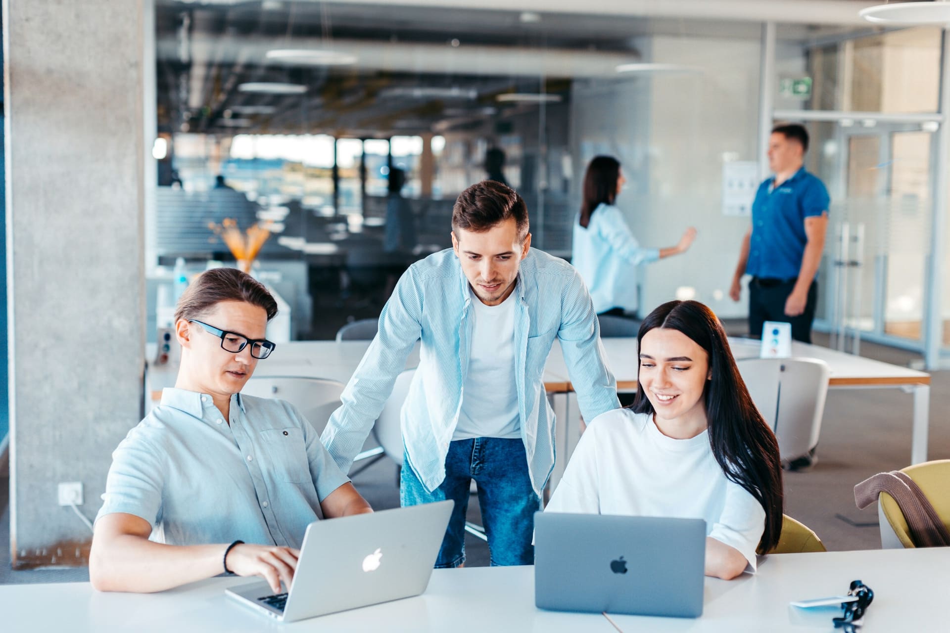 Collaboration environment: a team working across several laptops.